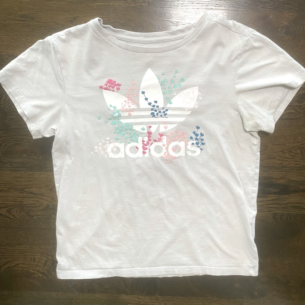 Grey Adidas baby tee with pink and blue blossoms